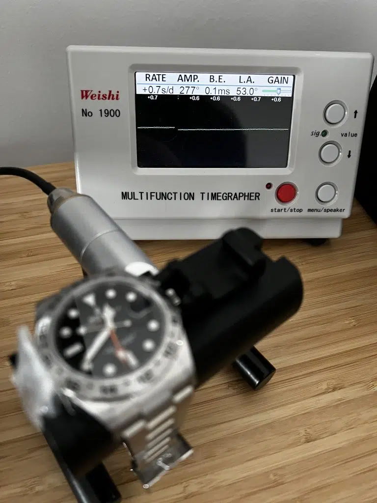 Mechanical watch on a Timegrapher during QC testing