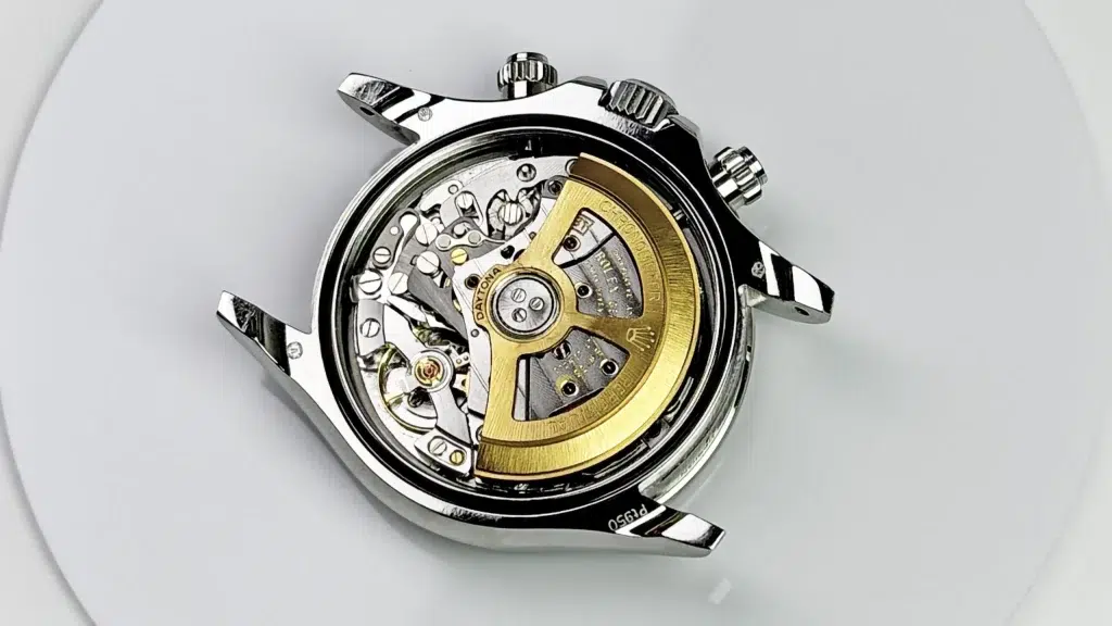 Clone automatic watch movement visible through an exhibition caseback