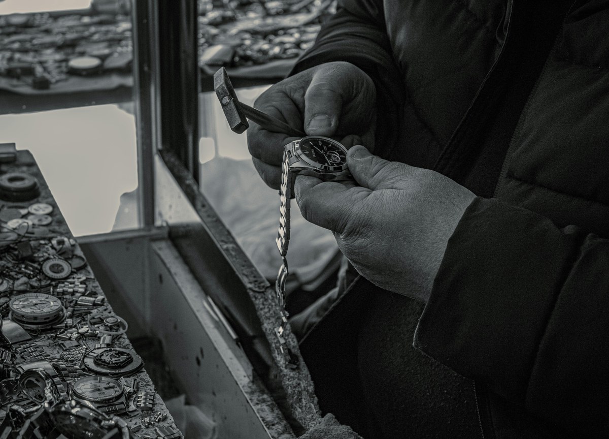 Wristwatch quality control inspection before shipment