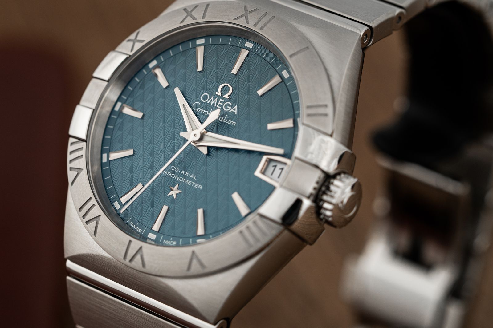 Close view of Rolex-style watch details used for movement and dial review