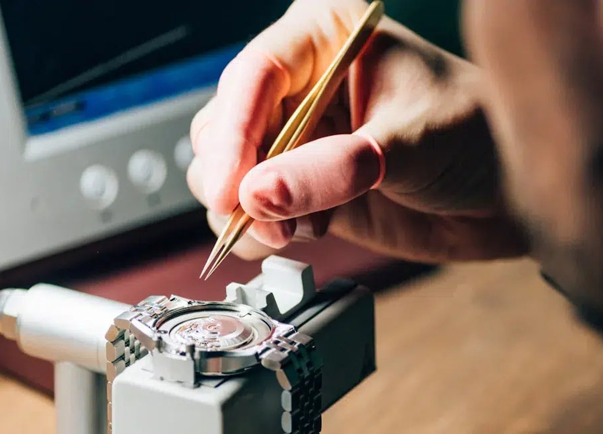 Rolex-style super clone watch undergoing pre-shipment quality control