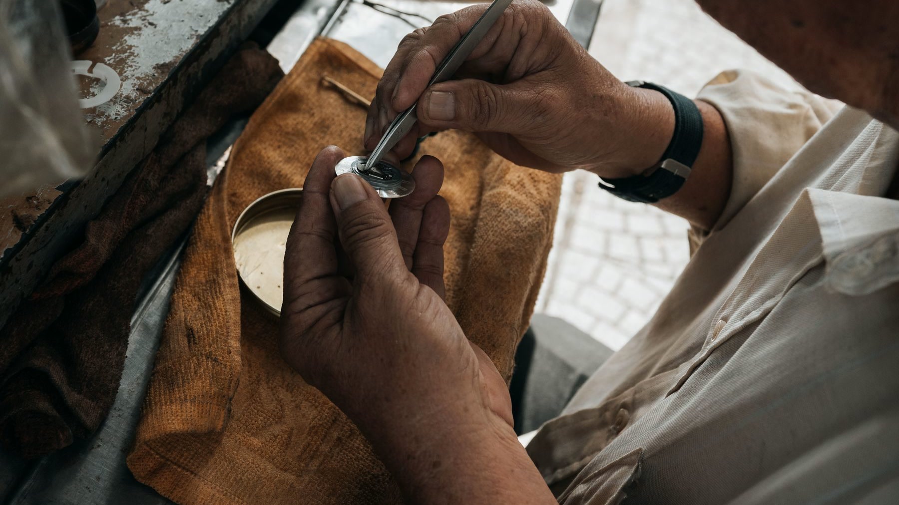Watch quality inspection workbench with tools and a prepared watch