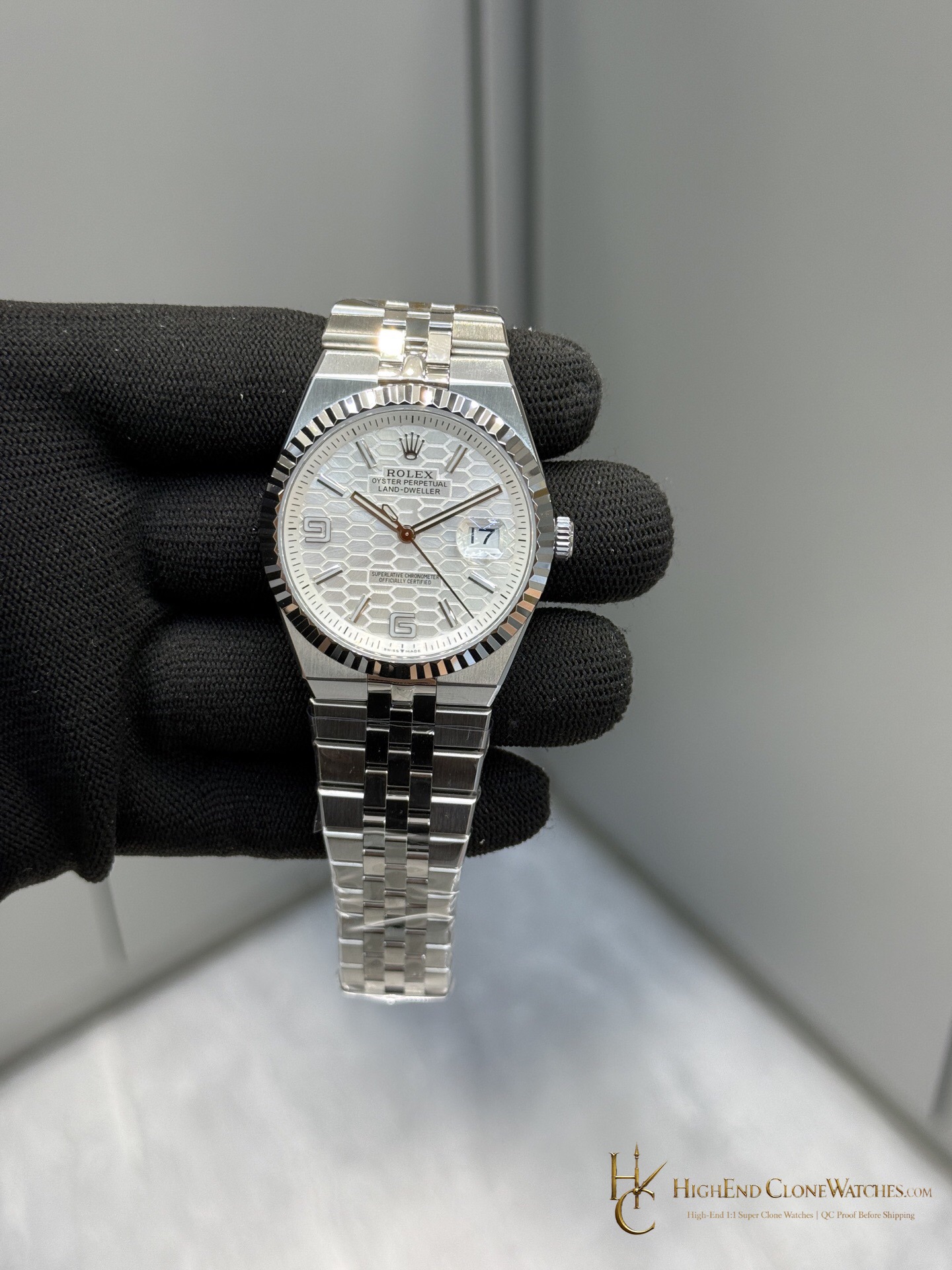 Rolex Land-Dweller 127334 white honeycomb dial angled view super clone watch